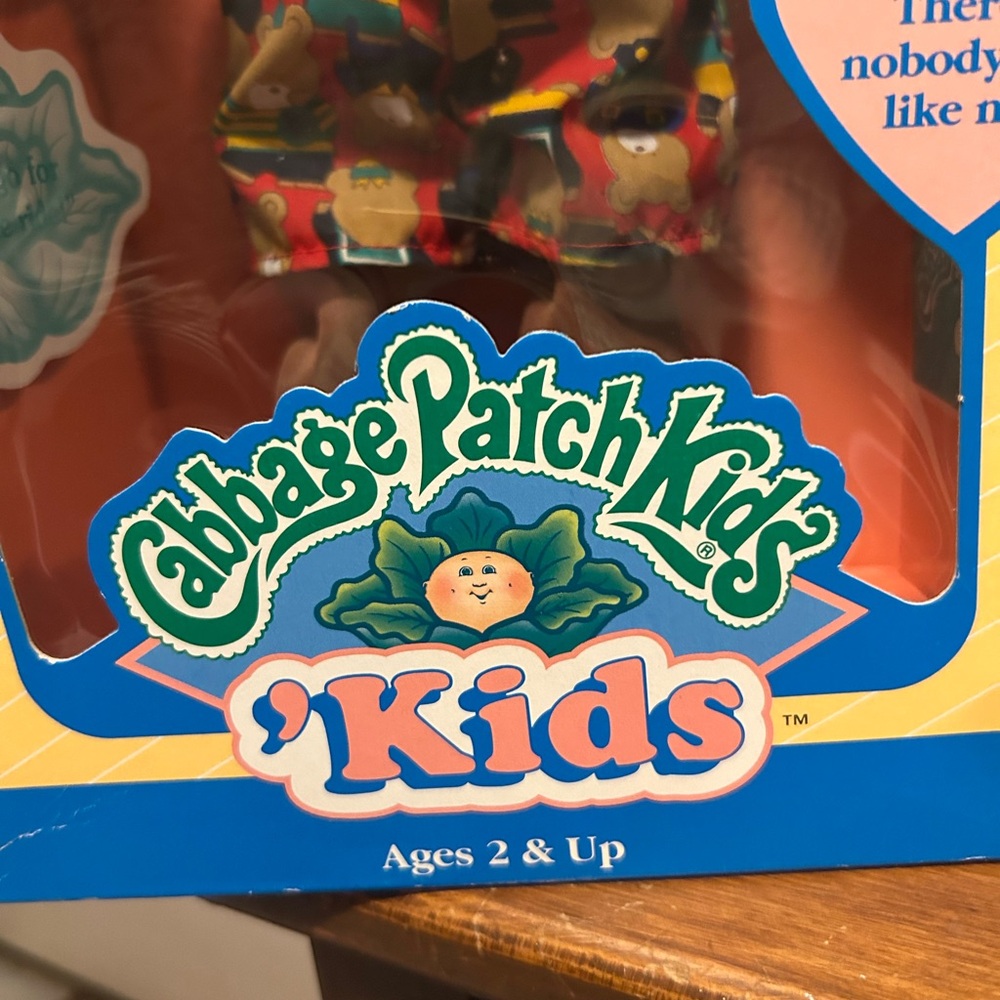 Colorful Cabbage Patch Kids Doll with Plush Body and Cheerful Expression - Picture 3 of 4